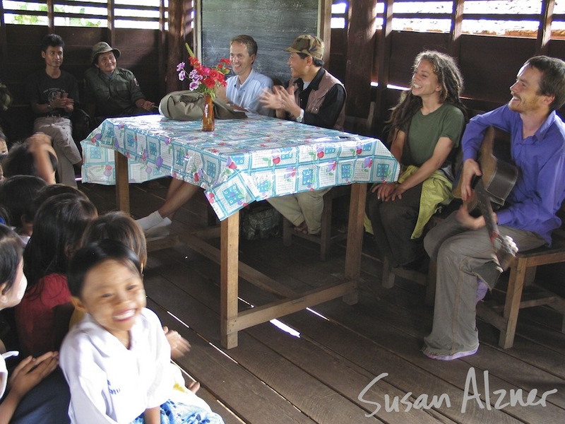 Ani DiFranco and Damien Rice sharing music with school children in the Karen State of Burma
