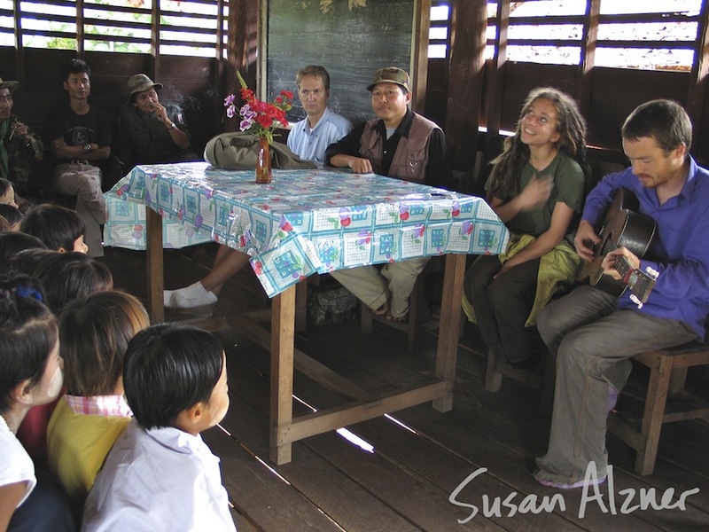 Ani DiFranco and Damien Rice sharing music with school children in the Karen State of Burma