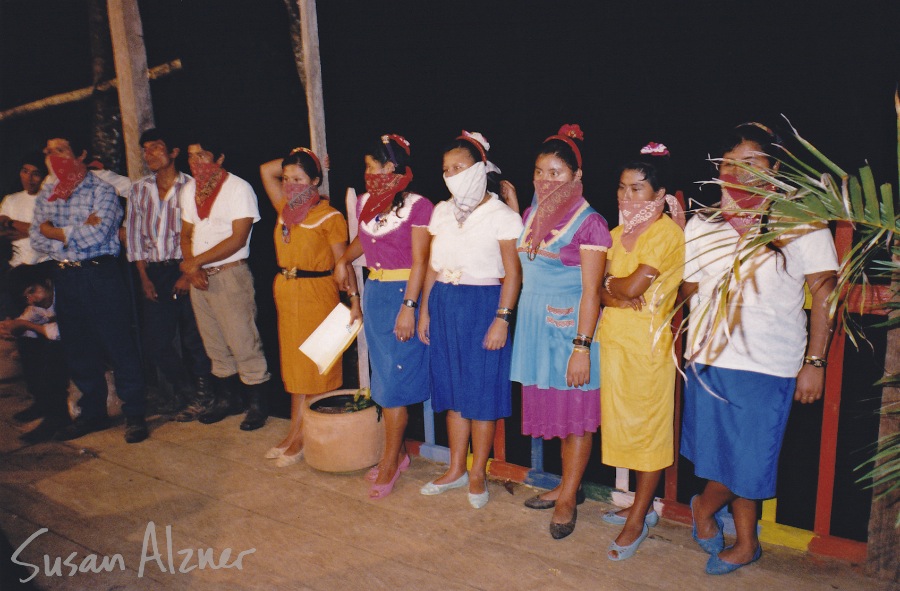 Zapatista men and women on stage during Indigo Girls and Michelle Malone performance for the village of La Realidad in Chiapas, Mexico