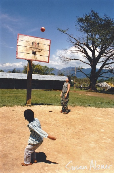 Amy Ray of Indigo Girls plays basketball with children in the Zapatista village of La Realidad in Chiapas, Mexico